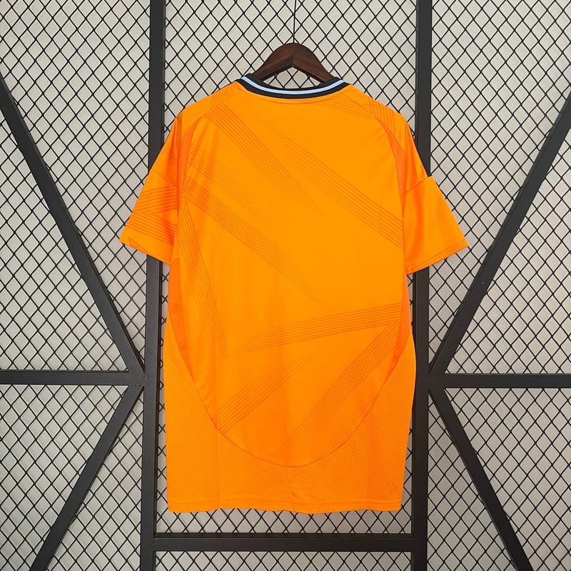 CAMISETA NARANJA REAL MADRID 24/25